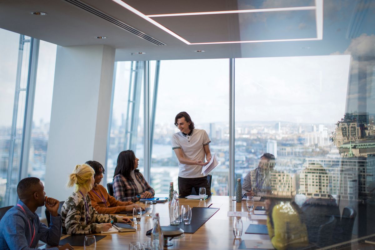 Businessman leading conference room meeting, Businessman leading conference room meeting in highrise office. (Photo by CAIA IMAGE/SCIENCE PHOTO LIBRARY / NEW / Science Photo Library via AFP) Businessman leading conference room meeting