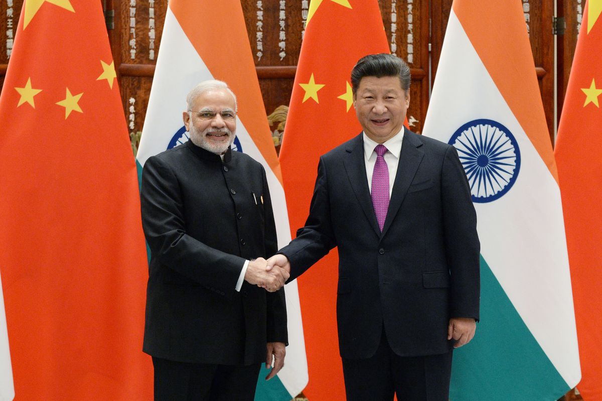 2016 G20 State Leaders Hangzhou Summit, HANGZHOU, CHINA - SEPTEMBER 4: Indian Prime Minister Narendra Modi  ( L) shakes hands with Chinese President Xi Jinping (R) at the West Lake State Guest House on September 4, 2016 in Hangzhou, China. The 11th G20 Leaders Summit will be held from September 4-5. (Photo by Wang Zhou - Pool/Getty Images)