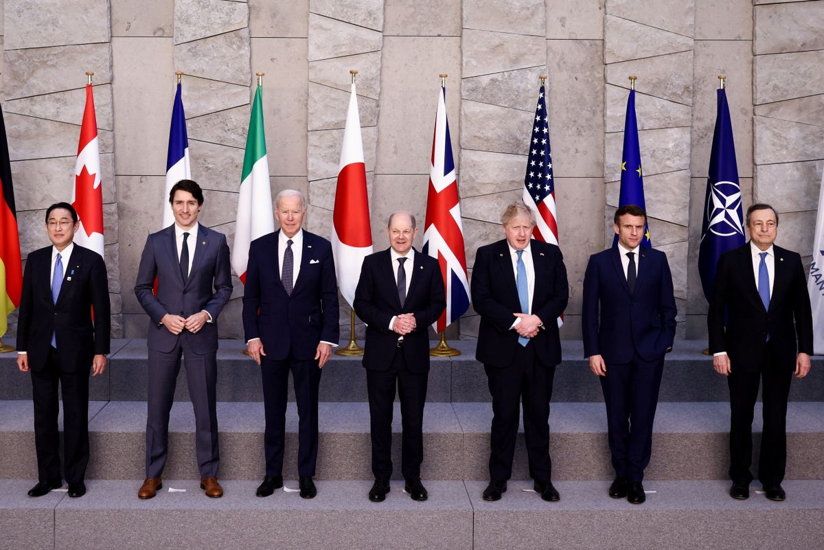 NATO Summit On Russia's Invasion Of Ukraine, BRUSSELS, BELGIUM - MARCH 24: Japan's Prime Minister Fumio Kishida, Canada's Prime Minister Justin Trudeau, U.S. President Joe Biden, Germany's Chancellor Olaf Scholz, British Prime Minister Boris Johnson, France's President Emmanuel Macron and Italy's Prime Minister Mario Draghi pose for a G7 leaders' family photo during a NATO summit on Russia's invasion of Ukraine, at the alliance's headquarters in Brussels, on March 24, 2022 in Brussels, Belgium. Heads of State and Government take part in the North Atlantic Council (NAC) Summit. They will discuss the consequences of President Putin's invasion of Ukraine and the role of China in the crisis. Then decide on the next steps to strengthen NATO's deterrence and defence. (Photo Henry Nicholls - Pool/Getty Images)