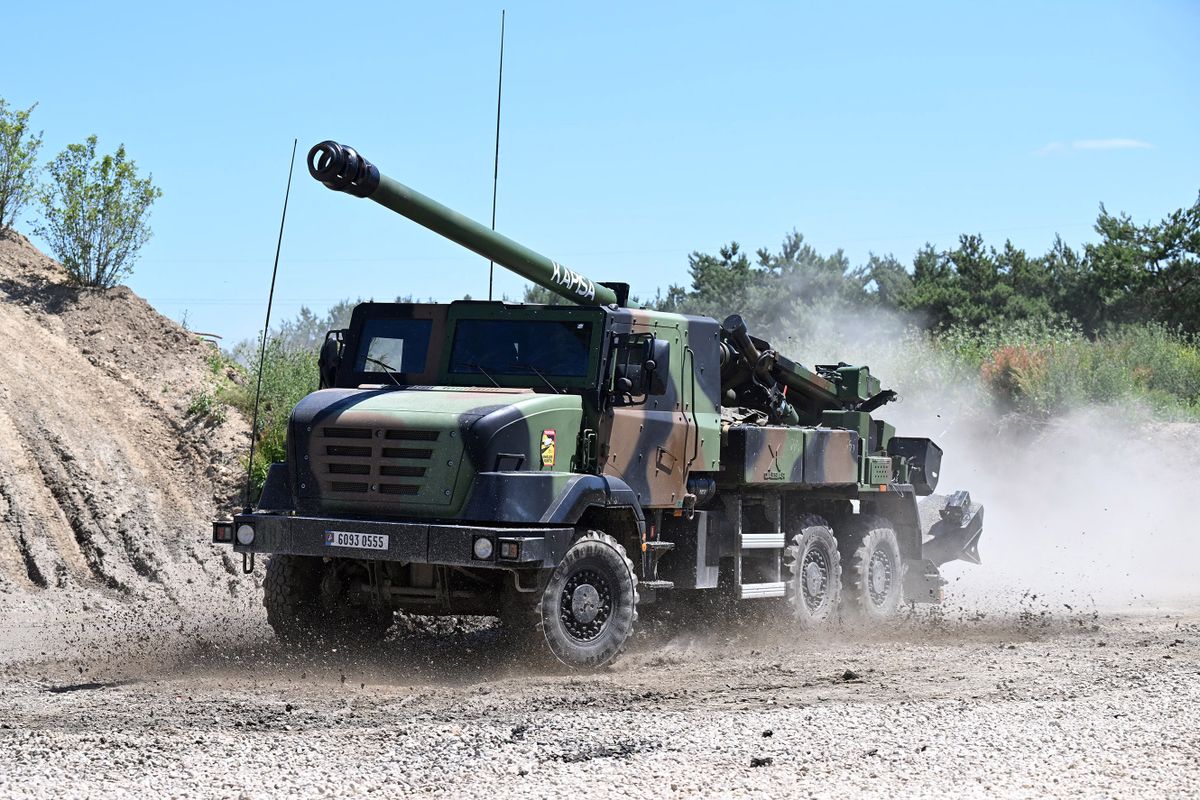 French army soldiers drive a 'CAESAR' self-propelled 155 mm/52-calibre gun-howitzer as they take part in a demonstration at the Eurosatory international land and airland defence and security trade fair, in Villepinte, a northern suburb of Paris, on June 12, 2022. 