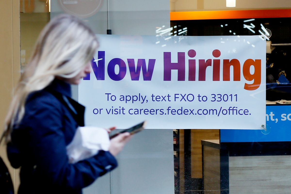 NEW YORK, NEW YORK - OCTOBER 21: A "Now Hiring" sign is displayed on a shopfront on October 21, 2022 in New York City. New employment statistics show that in the past month, the jobless rate in NYC decreased to 5.6%. 