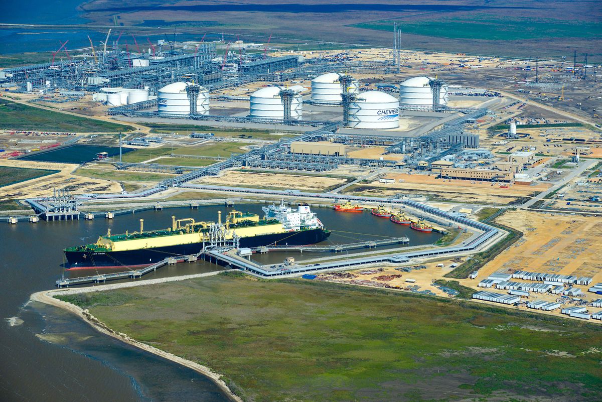 Cheniere Poised To Export First LNG Cargoes Today To Brazil, The Asia Vision LNG carrier ship sits docked at the Cheniere Energy Inc. terminal in this aerial photograph taken over Sabine Pass, Texas, U.S., on Wednesday, Feb. 24, 2016. Cheniere said in a statement last month. Cheniere Energy Inc. expects to ship the first cargo of liquefied natural gas on Wednesday to Brazil with another tanker to be loaded a few days later, marking the historic start of U.S. shale exports and sending its shares up the most in more than a month. Photographer: Lindsey Janies/Bloomberg via Getty Images