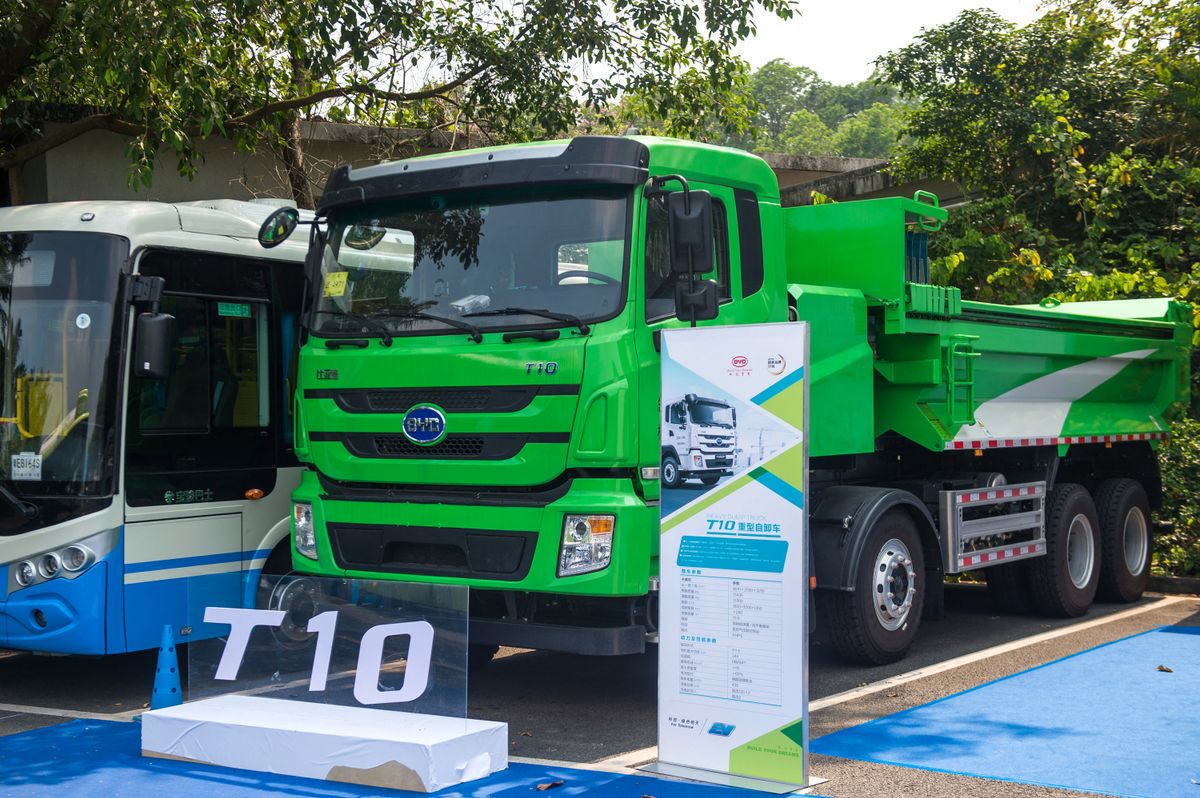 BYD faces legal, PR crisis over alleged advertising fraud case, --FILE--A BYD T10 electric truck is on display during an automobile exhibition in Shenzhen city, south China's Guangdong province, 23 May 2018.Chinese automaker BYD Auto Co has become embroiled in a potentially serious legal and public relations crisis as details continue to emerge after the carmaker accused several people of illegally using its name in business deals that involve domestic advertising firms, suppliers and a UK soccer club. Since BYD issued an initial statement in June, accusing certain "entities or individuals" of illegally using its name, a Shanghai-based woman named Li Juan was arrested by Shanghai authorities. But things have not cooled down, with some questioning BYD's handling of the case. Many advertising companies have pointed to loopholes in BYD's statements about the incident and questioned BYD's contention that it did not know Li had been using BYD's name to conduct business deals. "As a listed company, someone offers you free services worth 1.1 billion yuan ($16.44 million), and BYD only 'discovers' it three years later," domestic news website thepaper.cn reported Saturday, citing a supplier involved in the case. (Photo by Blanches / Imaginechina / Imaginechina via AFP)