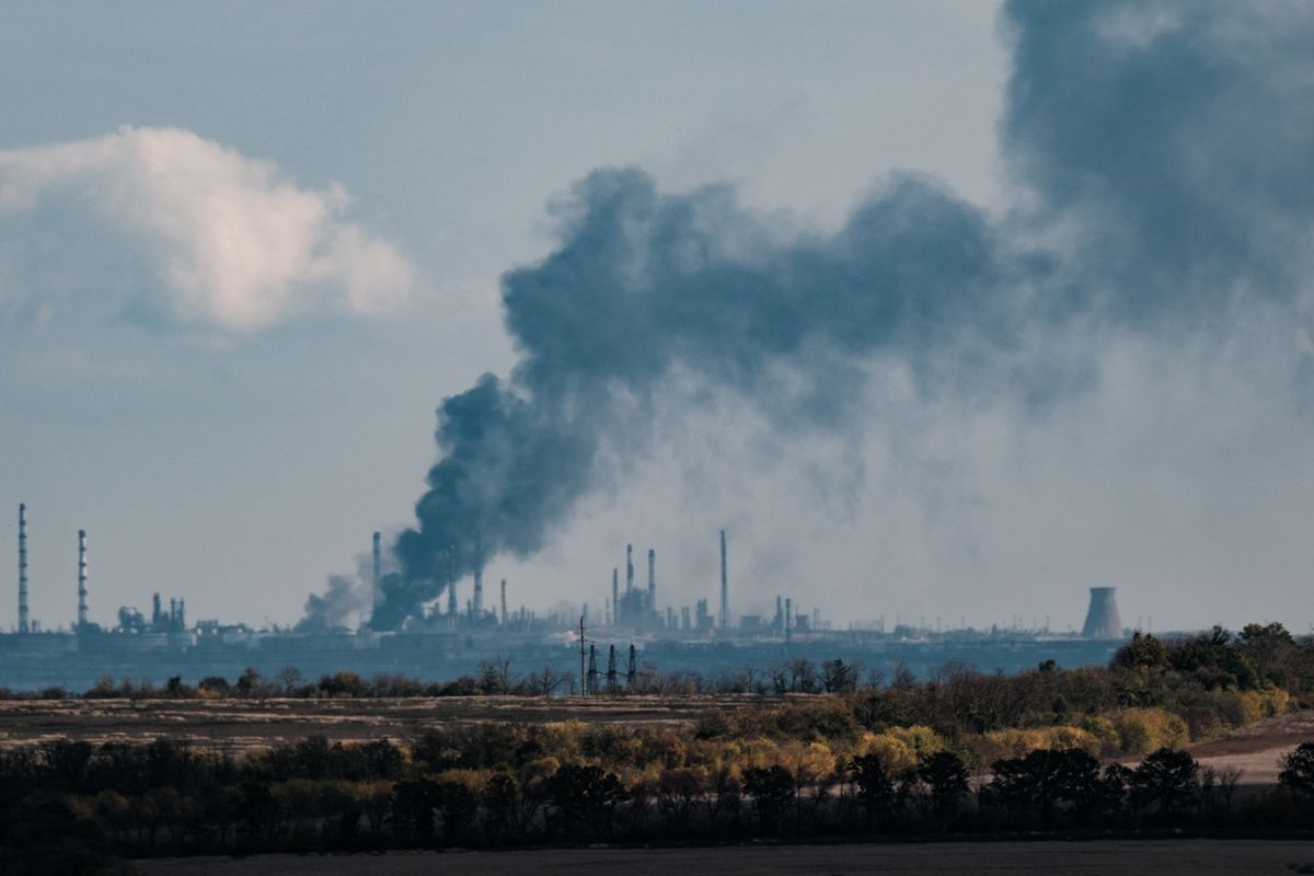 A black smoke is seen near Slovianska heat power station in the Donetsk region on October 13, 2022, amid the Russian invasion of Ukraine. 