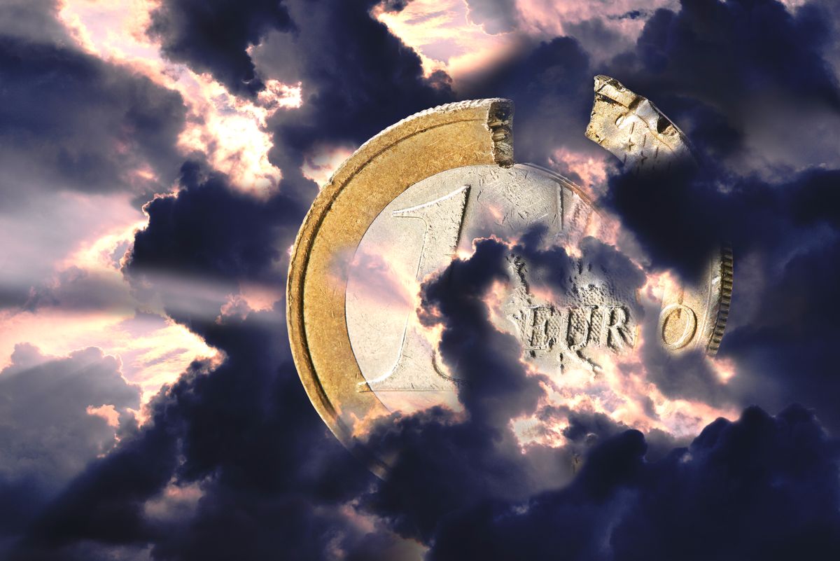 A,Damaged,Euro,Coin,Shrouded,In,Bad,Weather,Clouds.,The A damaged Euro coin shrouded in bad weather clouds. The clouds are dark and glow red in the background. The European Union in the Kriese A damaged Euro coin shrouded in bad weather clouds. The clouds are dark and glow red in the background. The European Union in the Kriese, infláció, inflation, euro, european union, unio, 