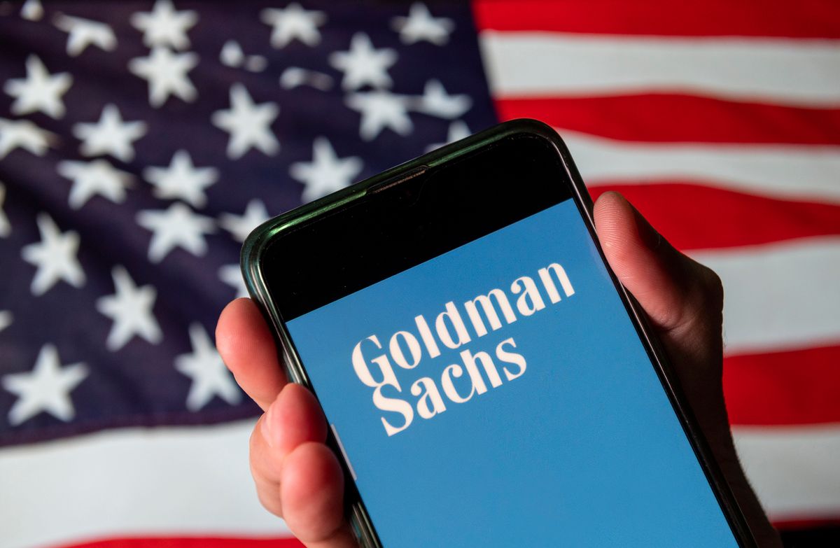 In this photo illustration the American multinational CHINA - 2020/08/13: In this photo illustration the American multinational investment bank and financial services company Goldman Sachs logo is seen on an Android mobile device with United States of America flag in the background. (Photo Illustration by Budrul Chukrut/SOPA Images/LightRocket via Getty Images)