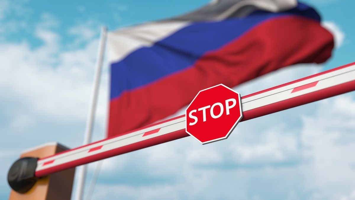 Barrier,Gate,Being,Closed,With,Flag,Of,Russia,As,A