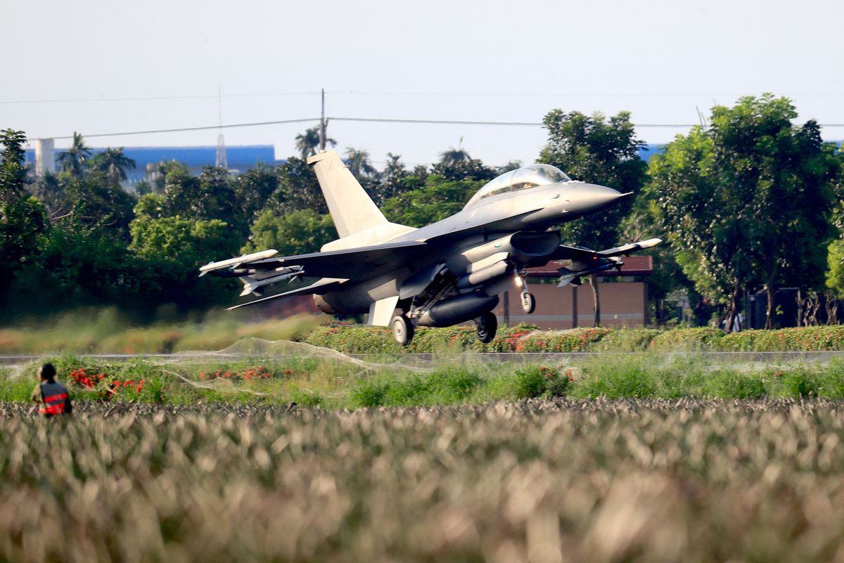 Fighter Jets Training During 37th Edition Of Han Kuang Military Drill, A F-16 fighter jet is deployed to conduct emergency landing and takeoff training, during the 37th edition of Han Kuang military drill, in Pingtung, Taiwan, 15 September 2021. Taiwan, with great relations between the US, Japan and some European countries including Czech Republic and Lithuania, has been facing intensifying threats from China, with Washington offering more arms sales to the self ruled island.  (Photo by Ceng Shou Yi/NurPhoto) (Photo by Ceng Shou Yi / NurPhoto / NurPhoto via AFP)