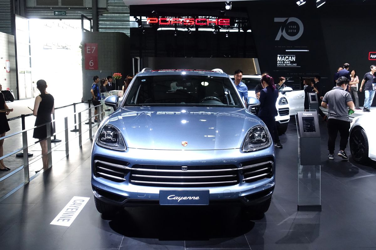 Porsche retains appeal for young Chinese women as sales grow 12% amid ebbing car tides --FILE--View of a Porsche Cayenne on display at an exhibition in Shanghai, China, 10 October 2018.German luxury sports car maker Porsche increased its sales in China, its biggest global market, last year while beating a downturn in the nation's passenger car sales. Porsche sold over 80,100 units in China, up 12 percent, while keeping the nation's position as the largest Porsche sales market for the fourth consecutive year, the China division of the Stuttgart-based firm announced at a press conference yesterday. Vehicle sales in China diminished in 2018 for the first time in two decades, and the German car firm's annual sales growth has fallen from a peak of 24 percent in 2015. (Photo by dycj / Imaginechina / Imaginechina via AFP)