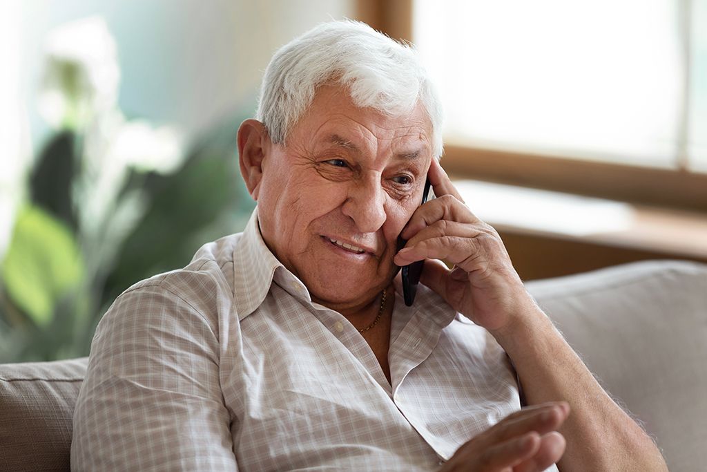 Smiling,Older,Man,Talking,On,Cellphone,Close,Up,,Happy,Grandfather