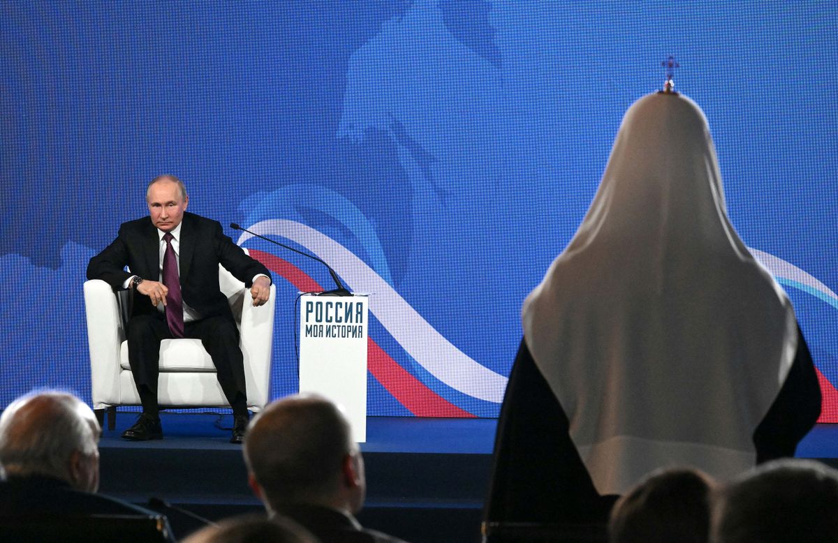Russian President Vladimir Putin attends a meeting with historians and representatives of traditional religions of Russia on the occasion of the 10th anniversary of the re-establishment of the Russian Historical and Russian Military Historical Societies, on National Unity Day in Moscow on November 4, 2022. 