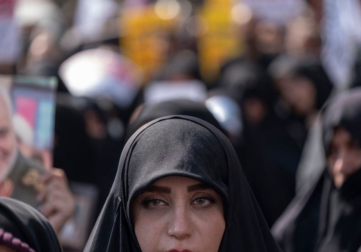An Iranian woman who is a supporter of Iran’s Supreme Leader Ayatollah Ali Khamenei takes part a pro-government rally against Iran’s anti government unrests, after Tehran’s Friday prayers, September 23, 2022.  