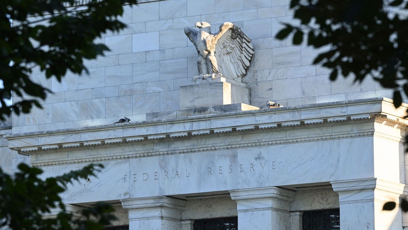 (FILES) In this file photo taken on August 18, 2022 the US Federal Reserve is seen in Washington, DC on August 18, 2022. - Recent signs of easing inflation pressures and a slowing US economy could allow the central bank to dial back the pace of interest rate hikes, Federal Reserve Governor Christopher Waller said on November 16, 2022.