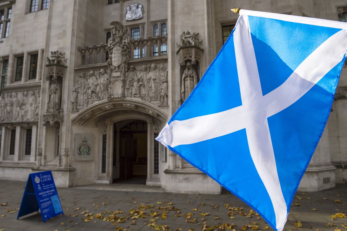 Scottish flag flying outside the Supreme Court of the United Kingdom public building in London, UK