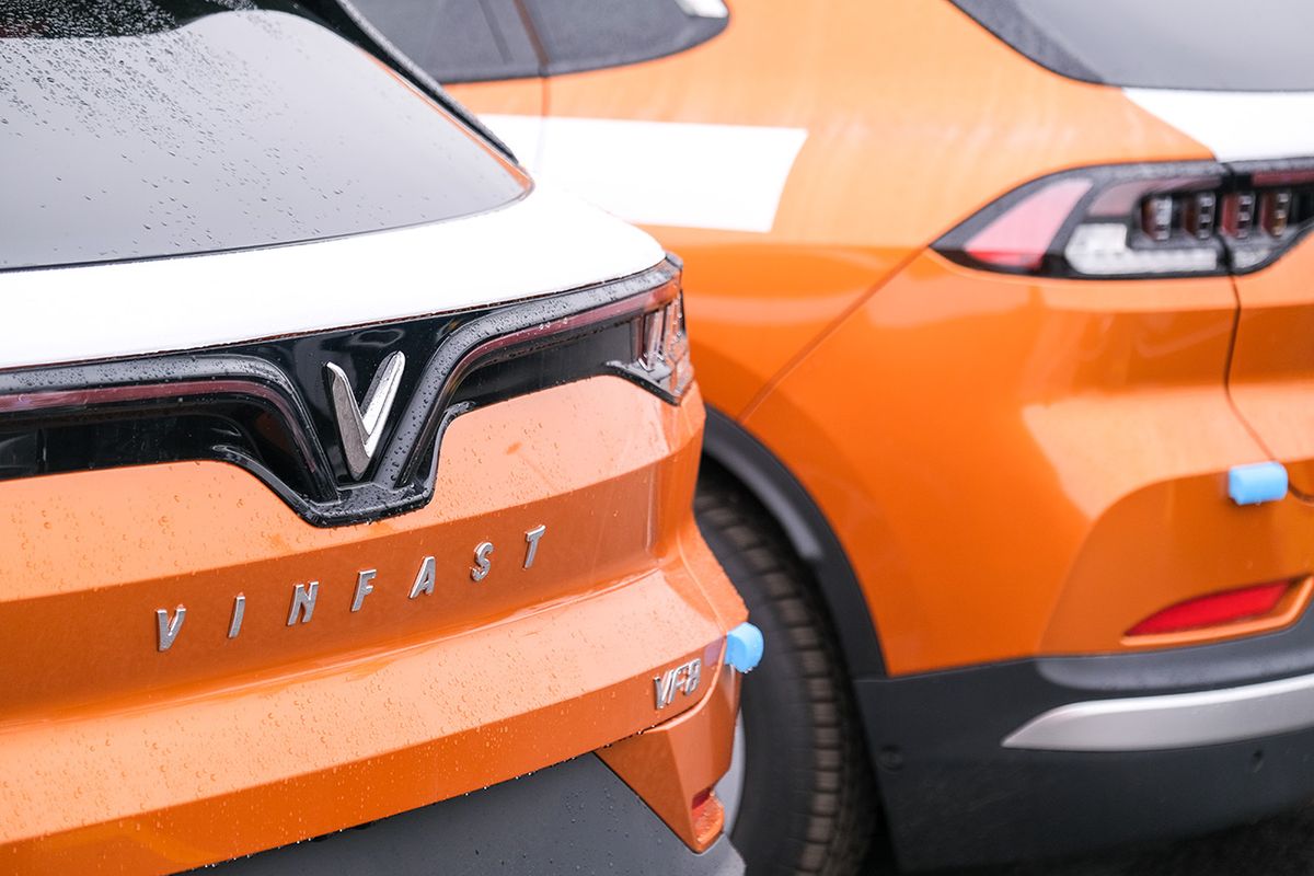 VinFast LLC's EV VF8 vehicles bound for shipment at the port in Haiphong, Vietnam, on Friday, Nov. 25, 2022. VinFast, which said in July that it had signed agreements with banks to raise at least $4 billion to help its US expansion, has about 73,000 global reservations for its EVs, according to the company. It has secured about $1.2 billion in incentives for its planned EV factory in North Carolina, where it intends to start production in 2024, according to the auto manufacturer.  Photographer: Linh Pham/Bloomberg via Getty Images