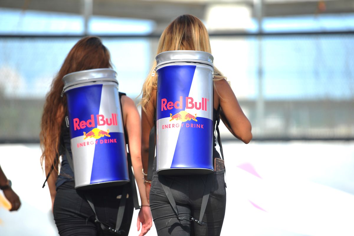 Kuala,Lumpur,,September,10th,,2016:,Two,Young,Girl,Doing,Red, Kuala Lumpur, September 10th, 2016: Two young girl doing Red Bull energy drink advertising promotion in public. 