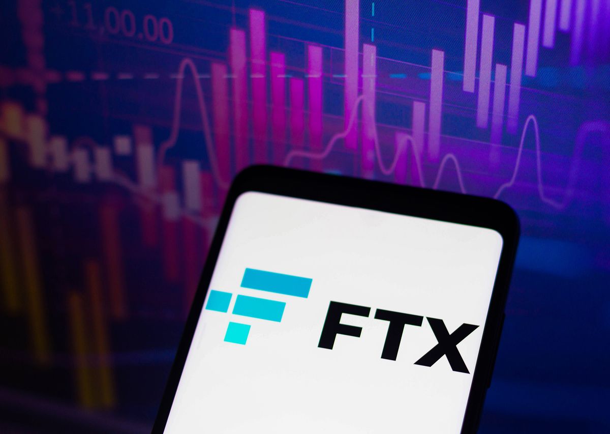 In this photo illustration, the logo of the FTX, a