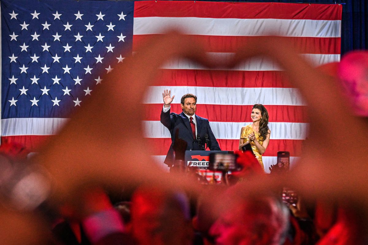 Republican gubernatorial candidate for Florida Ron DeSantis walks onstage during an election night watch party at the Convention Center in Tampa, Florida, on November 8, 2022. - Florida Governor Ron DeSantis, who has been tipped as a possible 2024 presidential candidate, was projected as one of the early winners of the night in Tuesday's midterm election. (Photo by Giorgio VIERA / AFP) US-VOTE-ELECTION-FLORIDA-DESANTIS