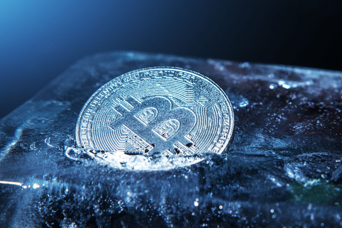The,Silver,Coin,Of,Cryptocurrency,Bitcoin,Is,Freezing,In,The, crypto, bitcoin, winter, tél, fagy, ice, freeze