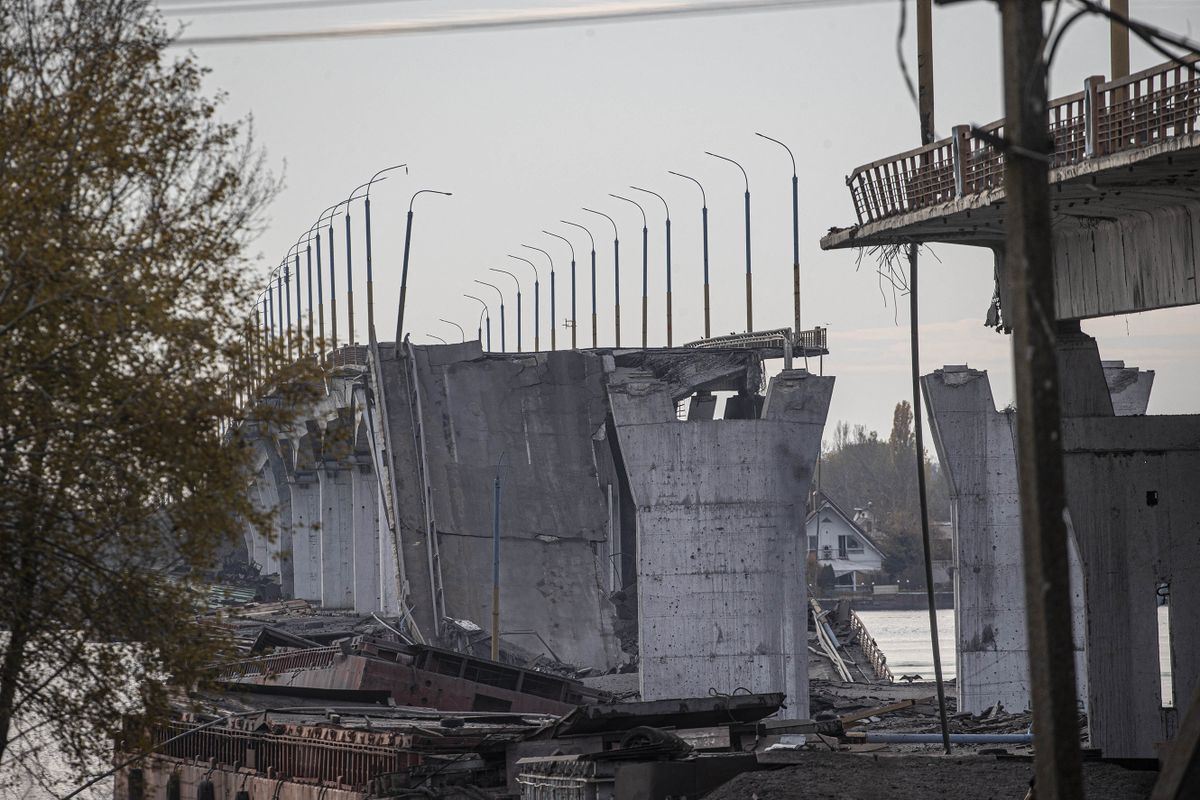 KHERSON, UKRAINE - NOVEMBER 14: Antonovski Bridge, which is allegedly demolished to stop Ukrainian forces from crossing the Dnieper River as Russian forces withdrew to its left side of the river, is seen after Russian retreat from Kherson, Ukraine on November 14, 2022. The only transportation road from Kherson to Crimea was the Antonovski Bridge. Metin Aktas / Anadolu Agency 