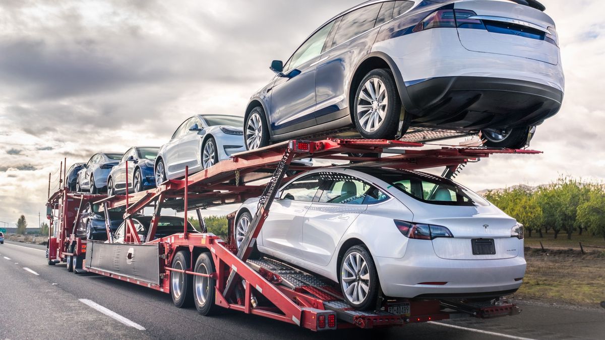 Dec,8,,2019,Bakersfield,/,Ca,/,Usa,-,Car, Dec 8, 2019 Bakersfield / CA / USA - Car transporter carries new Tesla vehicles along the interstate to South California, back view of the trailer