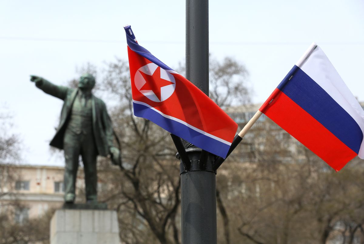 North Korean Leader Kim Jong Un Leaves Russia, The flags of North Korea, left, and Russia, decorate a street during a visit by Kim Jong Un, North Korea's leader, at the railway station in Vladivostok, Russia, on Friday, April 26, 2019. Kim said the summit will be a starting point for productive talks on cooperation, Vesti TV reported him as saying in an interview. Photographer: Andrey Rudakov/Bloomberg via Getty Images
