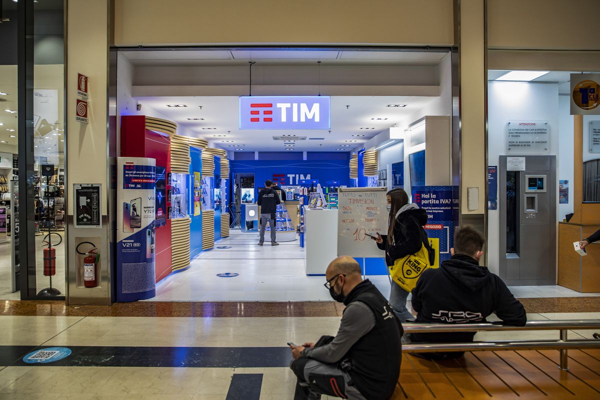 A TIM mobile phone shop, operated by Telecom Italia SpA, in Rozzano, Italy, on Tuesday, Nov. 23, 2021. KKR & Co. is setting the stage for a battle of control at Telecom Italia with a 10.8 billion-euro ($12.2 billion) bid pitting the U.S. private-equity fund against Frances Vivendi SE. 