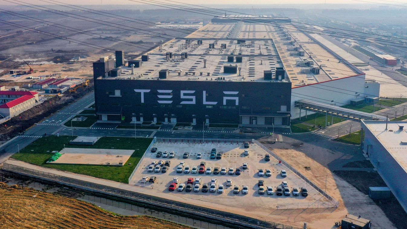 Made-in-China Tesla Model 3 delivered from Shanghai Gigafactory 3 An aerial view of over 200 Tesla Model 3 arrayed in Tesla Gigafactory 3 while more vehicles of the kind coming out of the factory, implying that mass production of made-in-China Tesla vehicles are about to come into the market, Shanghai, China, 8 December 2019. (Photo by Wu Ming / Imaginechina / Imaginechina via AFP)