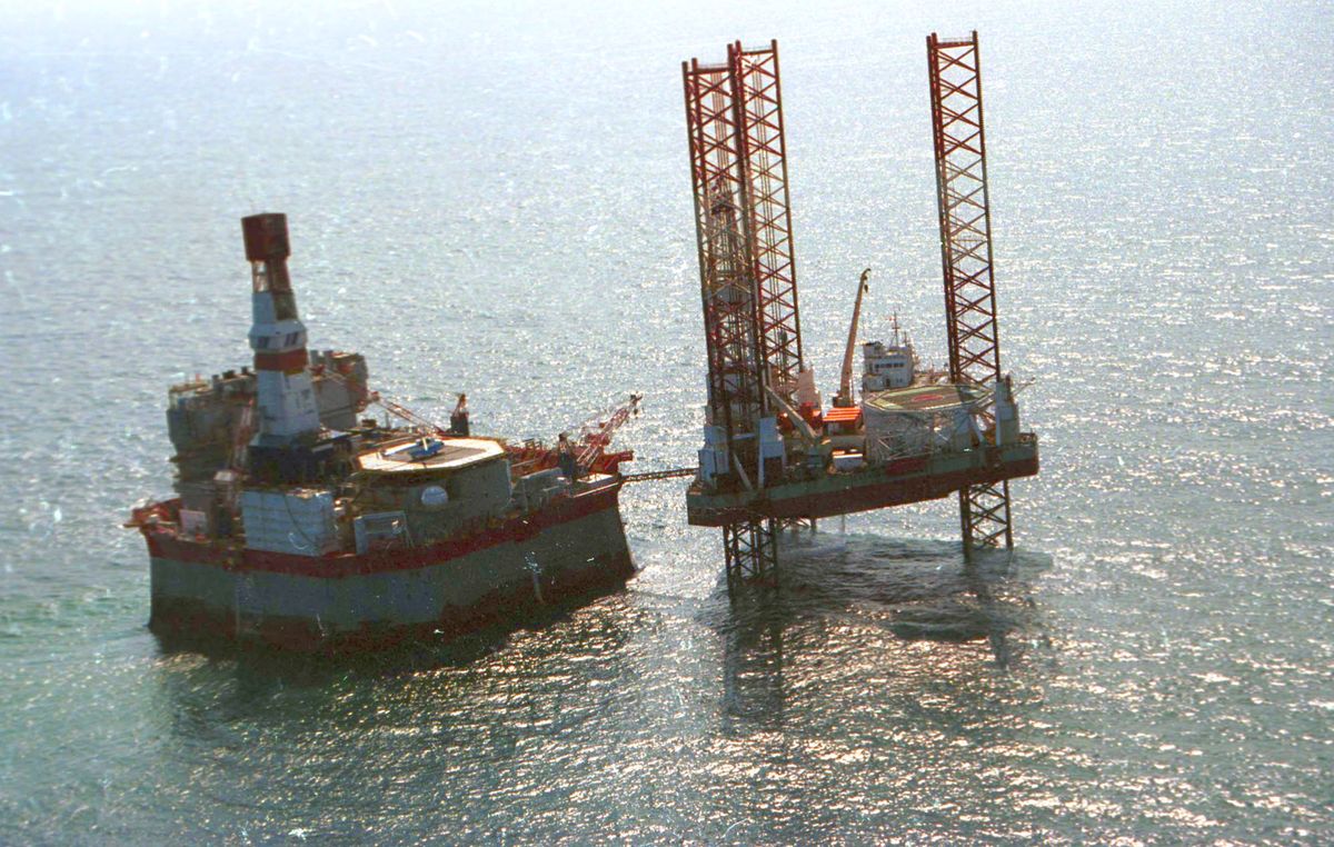Sakhalin Island in Russia, 388033 08: An oil derrick floats in the ocean near Sakhalin Island, the largest island in Russia, March 2001. Sakhalin Island, with its territory of 76,400 sq km, used to house convicted felons from the middle of 19th century. In addition to Russians who began settling on this island in the 18th century, there are aboriginal ethnic groups of Ains and Nivkhs, and a large group of Koreans. The main businesses of Sakhalin people are fishing and the oil industry. (Photo by Laski Diffusion/Wojtek Laski/Getty Images) 