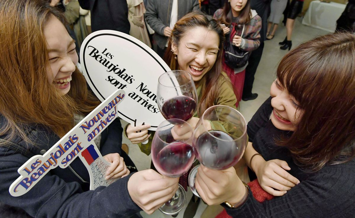 Beaujolais Nouveau wine released, Drinkers raise glasses of Beaujolais Nouveau on Nov, 17, 2016, immediately after the French wine was released at an event in Tokyo. (Kyodo)==Kyodo