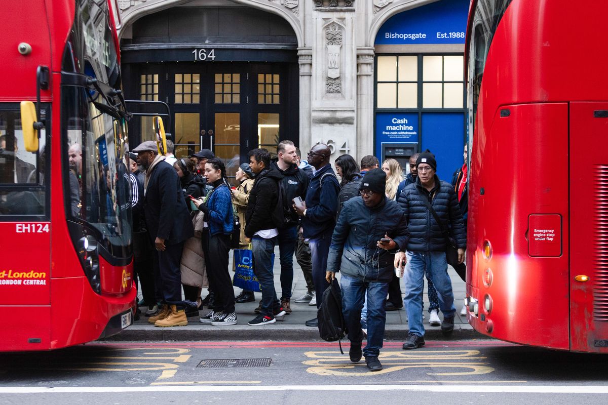 Commuters wait for buses near London Liverpool Street railway station, during a one day strike by London Underground workers, in London, UK, on Thursday, Nov. 10, 2022. Parisians and Londoners face similar chaos trying to get to and from offices on Thursday as public transportation workers strike to protest the rising cost of living. Photographer: 