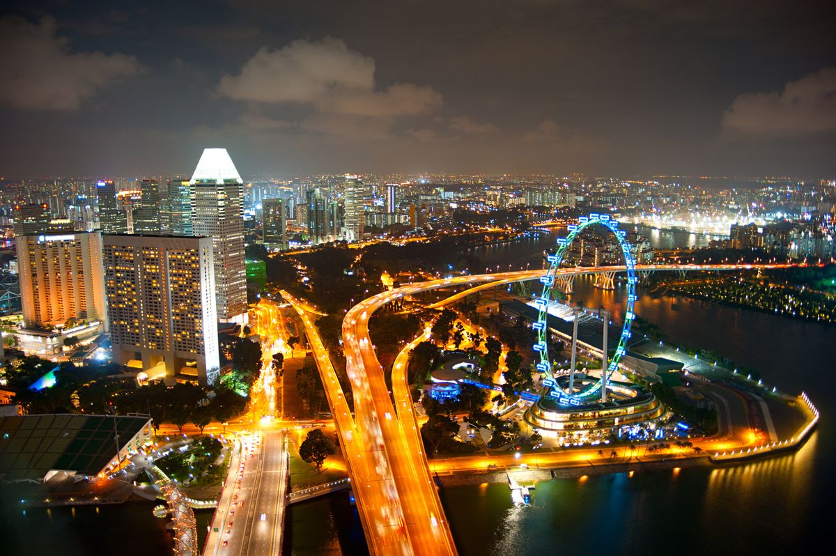 Aerial,View,Of,Singapore,With,Singapore,Flyer,In,The,Right