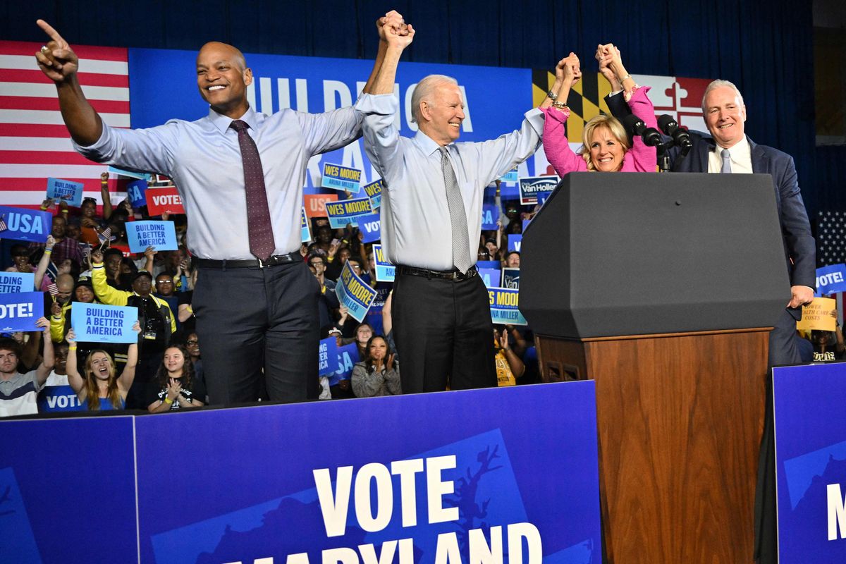 (From L) Gubernatorial candidate Wes Moore, US President Joe Biden, US First Lady Jill Biden and US Senator Chris Van Hollen acknowledge the crowd during a rally on the eve of the US midterm elections, at Bowie State University in Bowie, Maryland, on November 7, 2022. (Photo by Mandel NGAN / AFP)