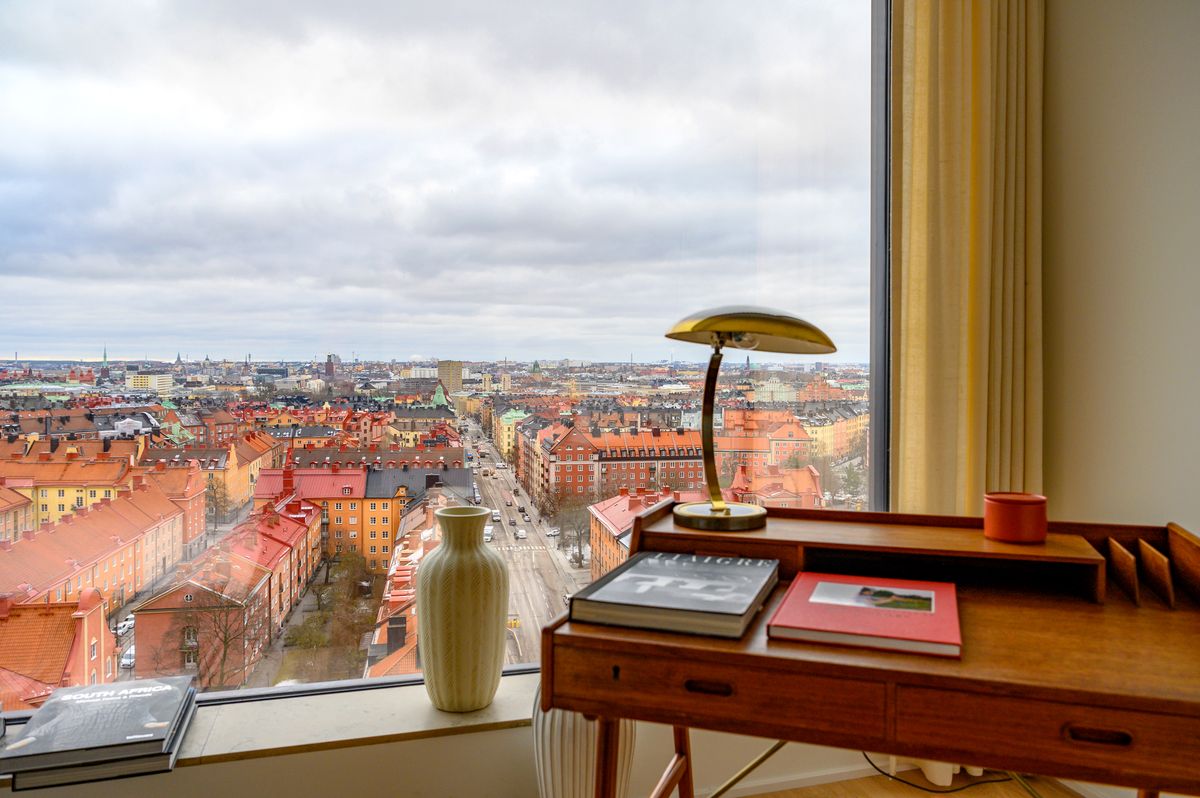 Unsold Luxury Homes Reveal Risk Behind A Swedish Profit Warning A panorama window from the master bedroom in an apartment in the 'Innovationen' residential skyscraper, developed by Oscar Properties Holding AB, looks out to the red, yellow and orange facades of the Vasastan neighborhood in Stockholm, Sweden, on Friday, March 8, 2019. Residential skyscrapers are rare in Stockholm, a city permeated by five-story, classic stone buildings built at the turn of the last century. Photographer: Mikael Sjoberg/Bloomberg via Getty Images