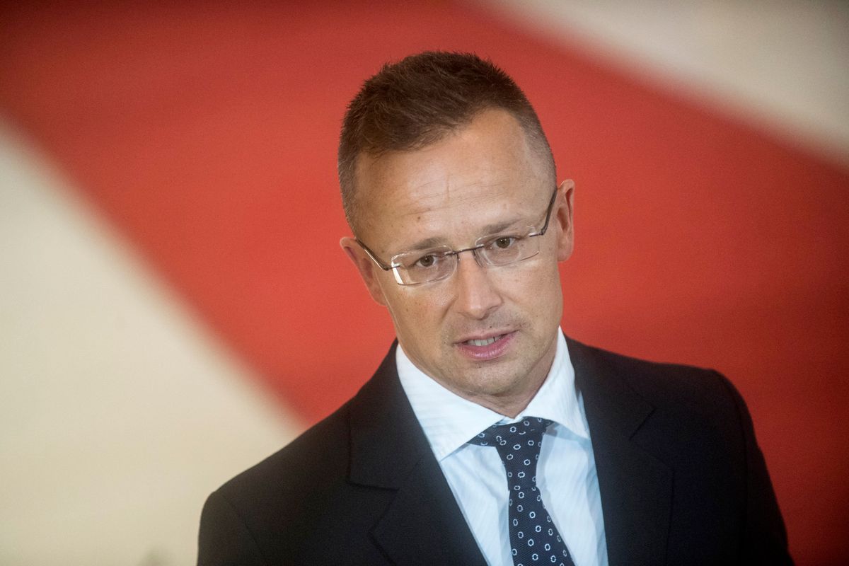 Hungarian Foreign Minister Peter Szijjarto speaks to journalists as he arrives at the EU Informal Meeting of EU Foreign Ministers (Gymnich) in Prague, Czech Republic on August 30, 2022. (Photo by Michal Cizek / AFP)