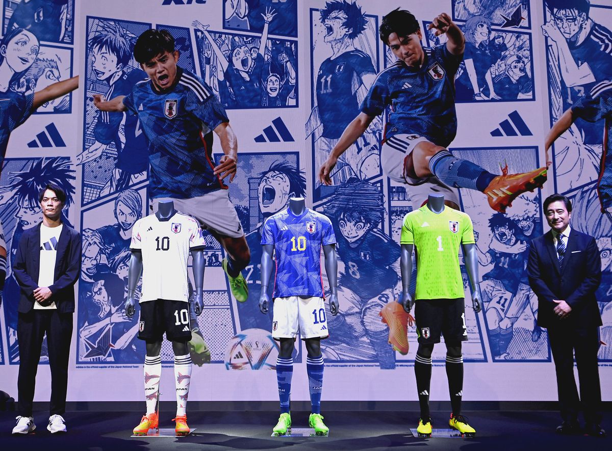 Japan soccer national team jersey unveiled, A photo shows the Japanese soccer national team jersey lineup (L-R) Away, Home, and goalkeeper by Adidas at a hotel in Chuo Ward, Tokyo on Aug. 29, 2022. The Japanese team will wear the uniform,  based on a concept design of Origami, folding paper, which Japanese people fold a paper to earn a victory.    ( The Yomiuri Shimbun ) (Photo by Keita Iijima / Yomiuri / The Yomiuri Shimbun via AFP)