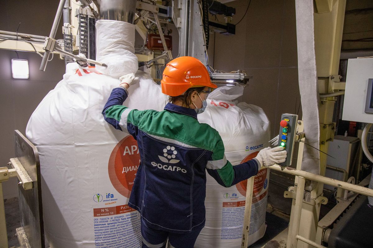 A worker operates a machine to fill sacks of Apaviva NPK(S) phosphate fertilizer at the PhosAgro-Cherepovets fertilizer plant, operated by PhosAgro PJSC, in Cherepovets, Russia, on Thursday, Dec. 2, 2021. Russia plans to impose a six-month quota on some fertilizer exports to safeguard local supplies and limit costs for farmers after the energy crisis sent nitrogen nutrient prices soaring. 