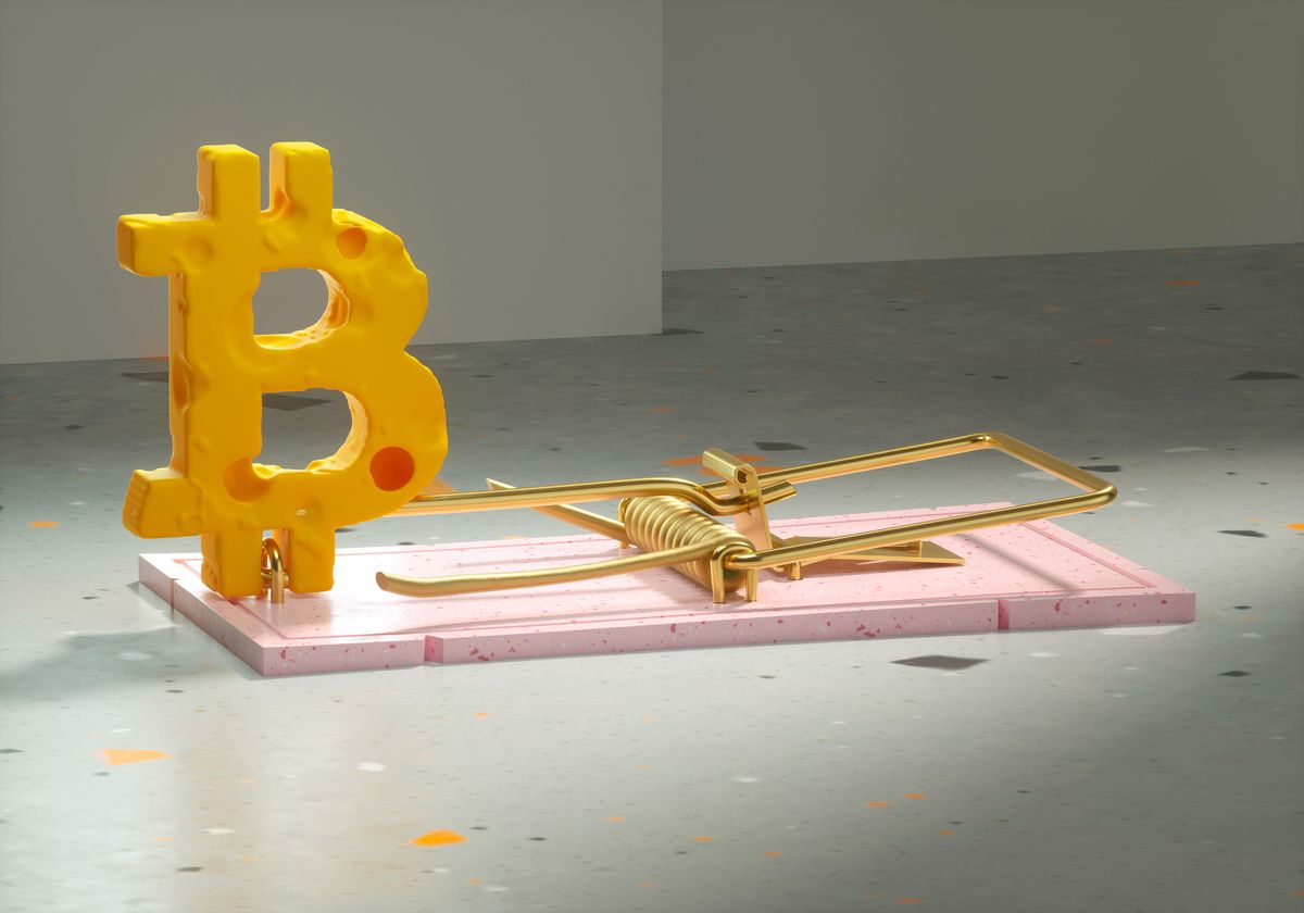 Bitcoin sign mousetrap, Digital generated image of bitcoin sign made out of cheese loaded into mousetrap on green surface.
