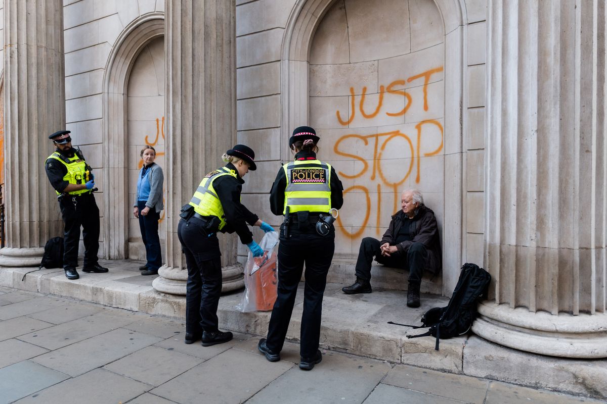 Just Stop Oil Target Bank of England in London
LONDON, UNITED KINGDOM - OCTOBER 31: Just Stop Oil supporters sprayed paint onto the Bank of England on their 31st day of continuous protest to demand that the UK Government stops new oil and gas projects in London, United Kingdom on October 31, 2022. Wiktor Szymanowicz / Anadolu Agency (Photo by Wiktor Szymanowicz / ANADOLU AGENCY / Anadolu Agency via AFP)