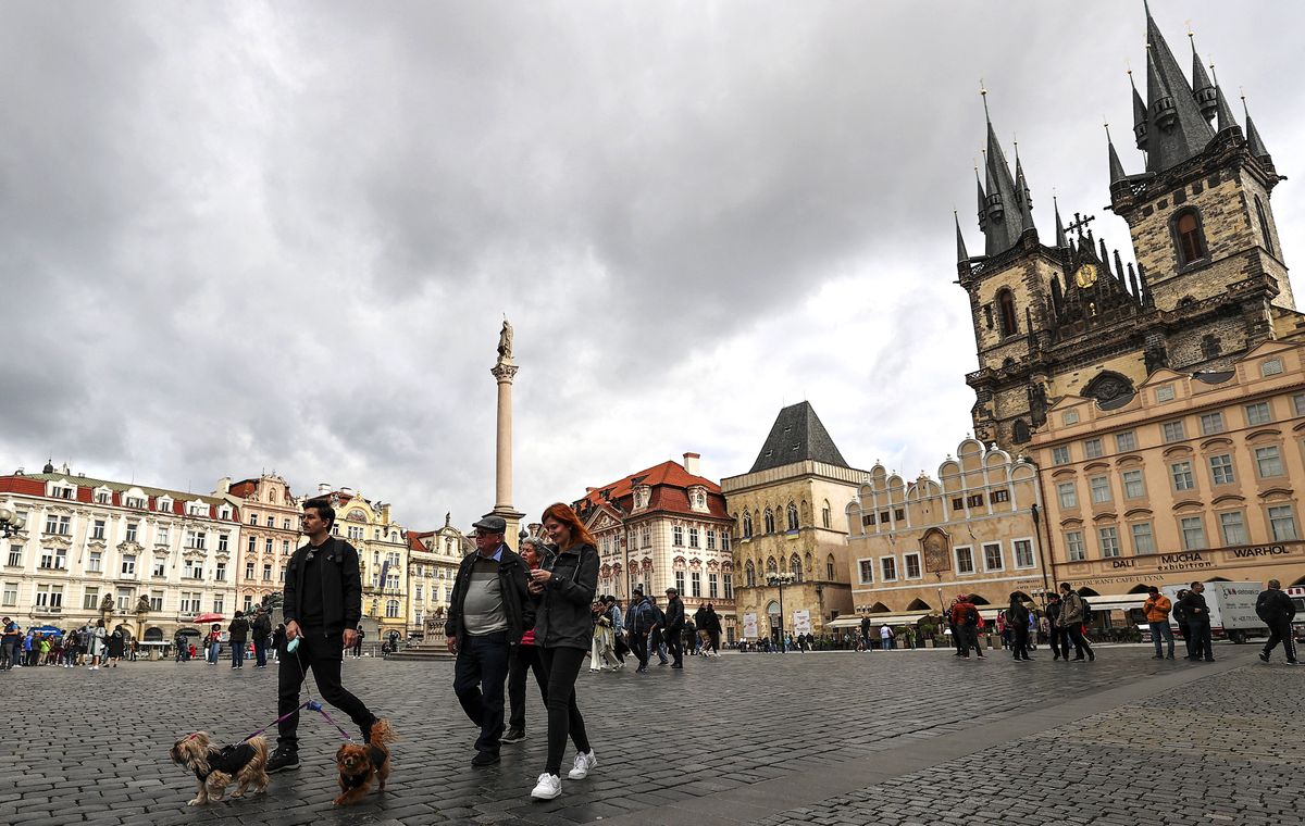 Scenery from the heart of Europe: Prague PRAGUE, CZECH REPUBLIC - OCTOBER 04: People are seen walking around in Old Town Square in the capital of Czech Republic, Prague on October 4, 2022. Czechia's capital, Prague, takes visitors back in time with its photographic appearance. Prague, also known as the "City with 100 Towers," the "Roof of Europe," the "Heart of Europe," the "Golden City," and the "Mother of Cities," is not only the country's capital and largest city, but it is also a favored tourist destination. With its historical bridges, cathedrals, towers with gold tips, and castles, Prague is one of the top ten most visited towns in Europe. The city is also ideal for walking as it is located in a valley split by a river and surrounded by hills. Emin Sansar / Anadolu Agency (Photo by Emin Sansar / ANADOLU AGENCY / Anadolu Agency via AFP)