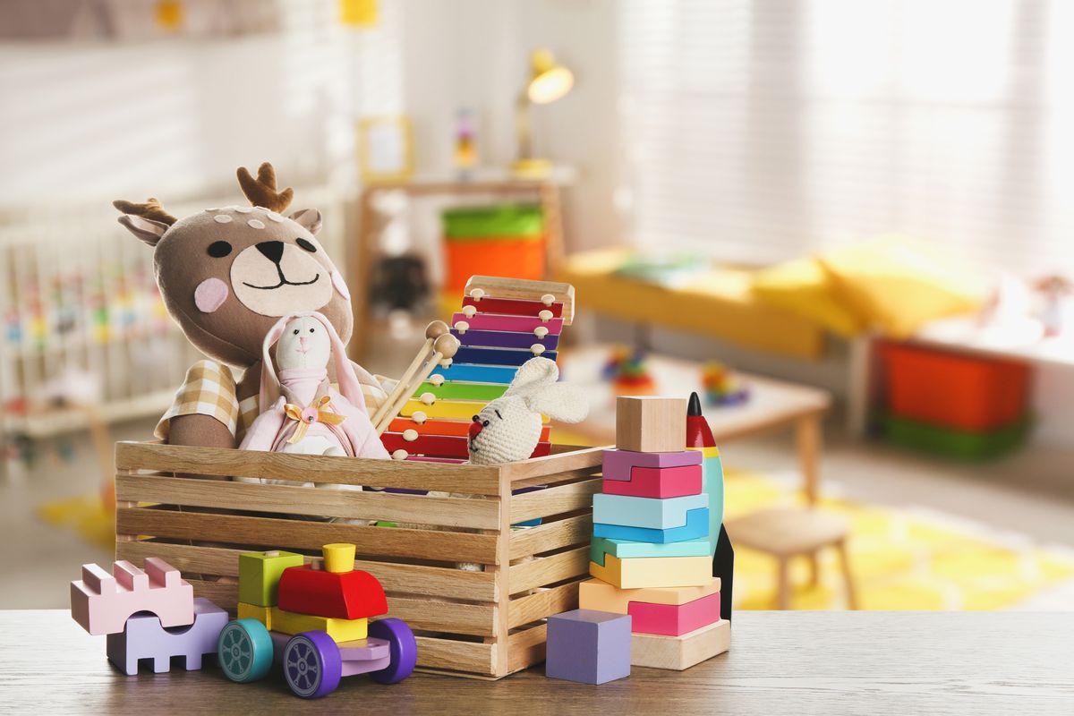 Set,Of,Different,Cute,Toys,On,Wooden,Table,In,Children's, Set of different cute toys on wooden table in children's room gyerekjáték, gyerek, játék, építőkocka, plüss, 