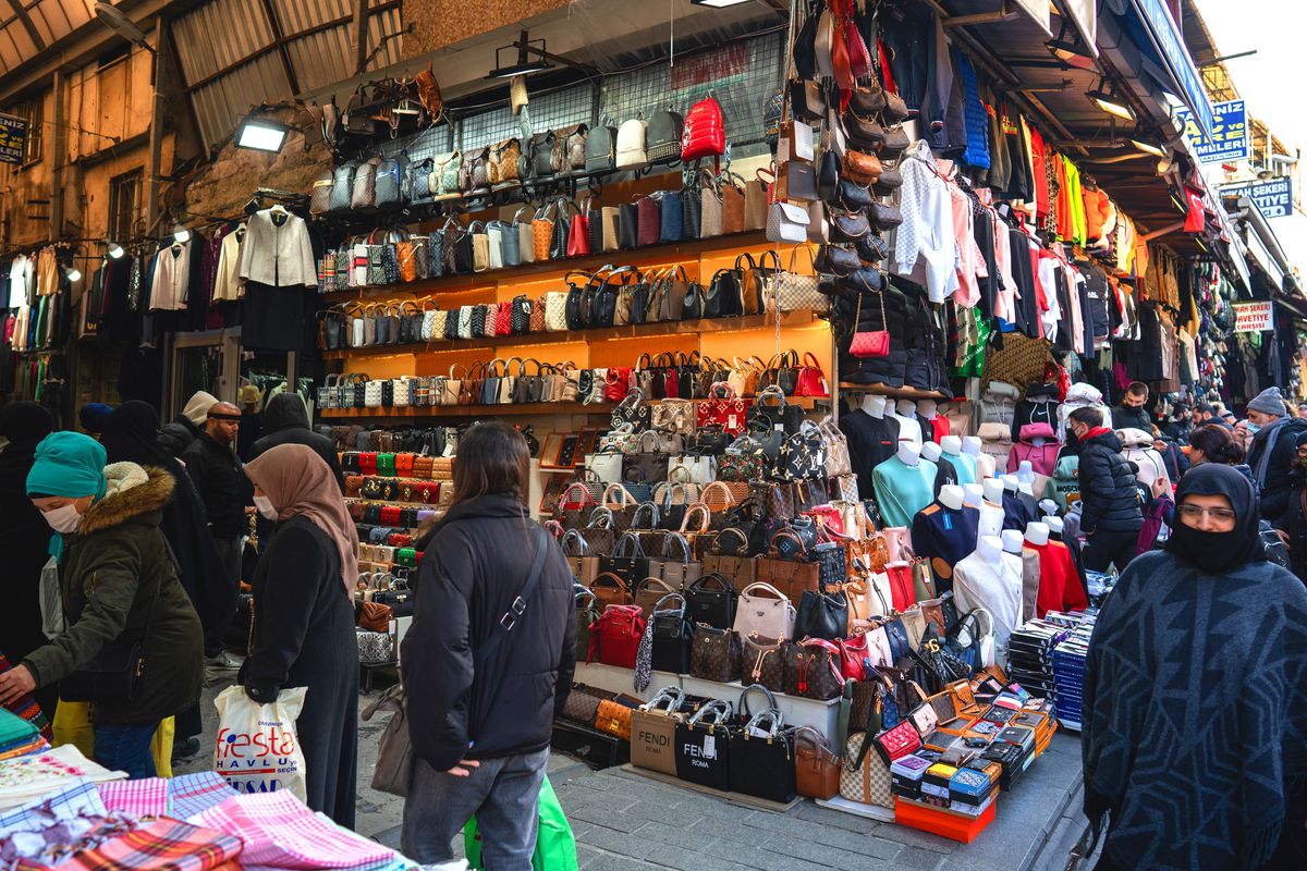 Economy In Turkey, People doing shopping at the market in Istanbul, Turkey on December 24, 2021. Turkey created a new economic model to prevent the rise in the exchange rate and to add value to the Turkish lira. After the announcement of the Turkish President Recep Tayyip Erdogan, Turkish lira gained value. (Photo by Erhan Demirtas/NurPhoto) (Photo by Erhan Demirtas / NurPhoto / NurPhoto via AFP)