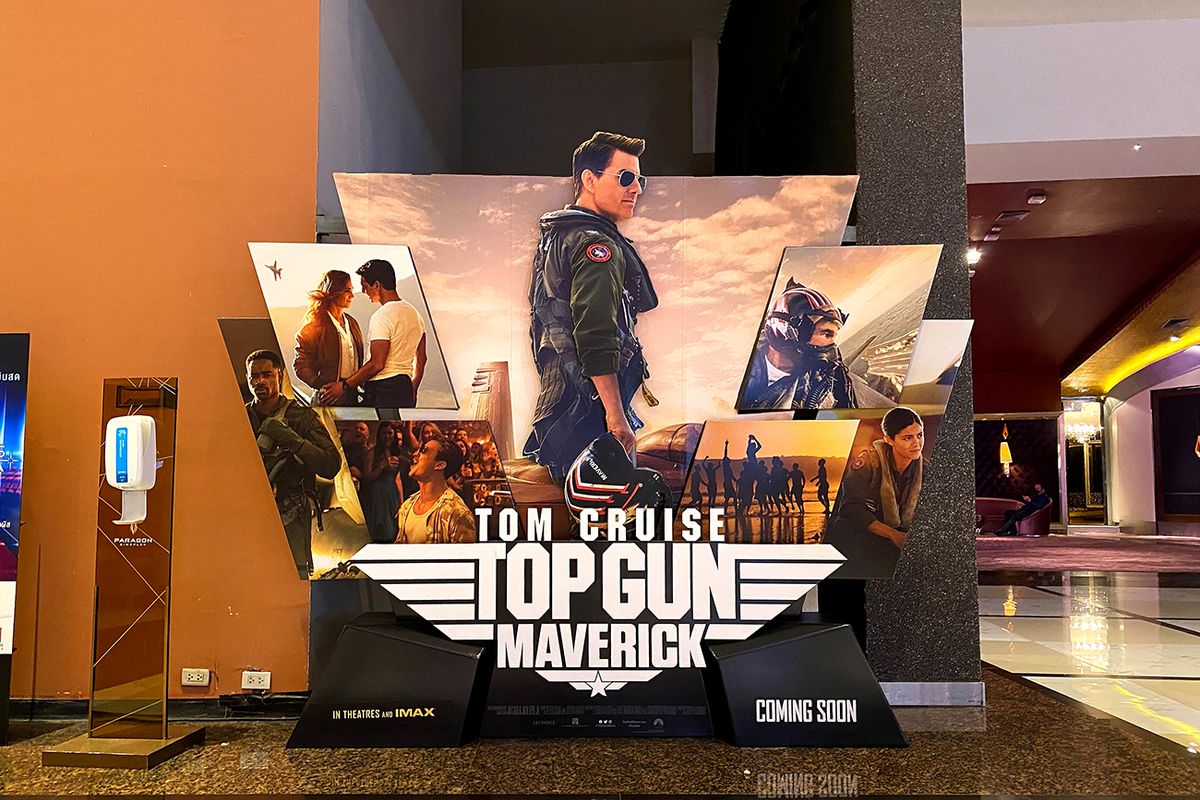 Bangkok,,Thailand,-,May,7,,2022:,Standee,Of,The,Movie Bangkok, Thailand - May 7, 2022: Standee of the movie Top Gun Maverick stars by Tom Cruise as Captain Pete "Maverick" Mitchell Displays at the theater. 