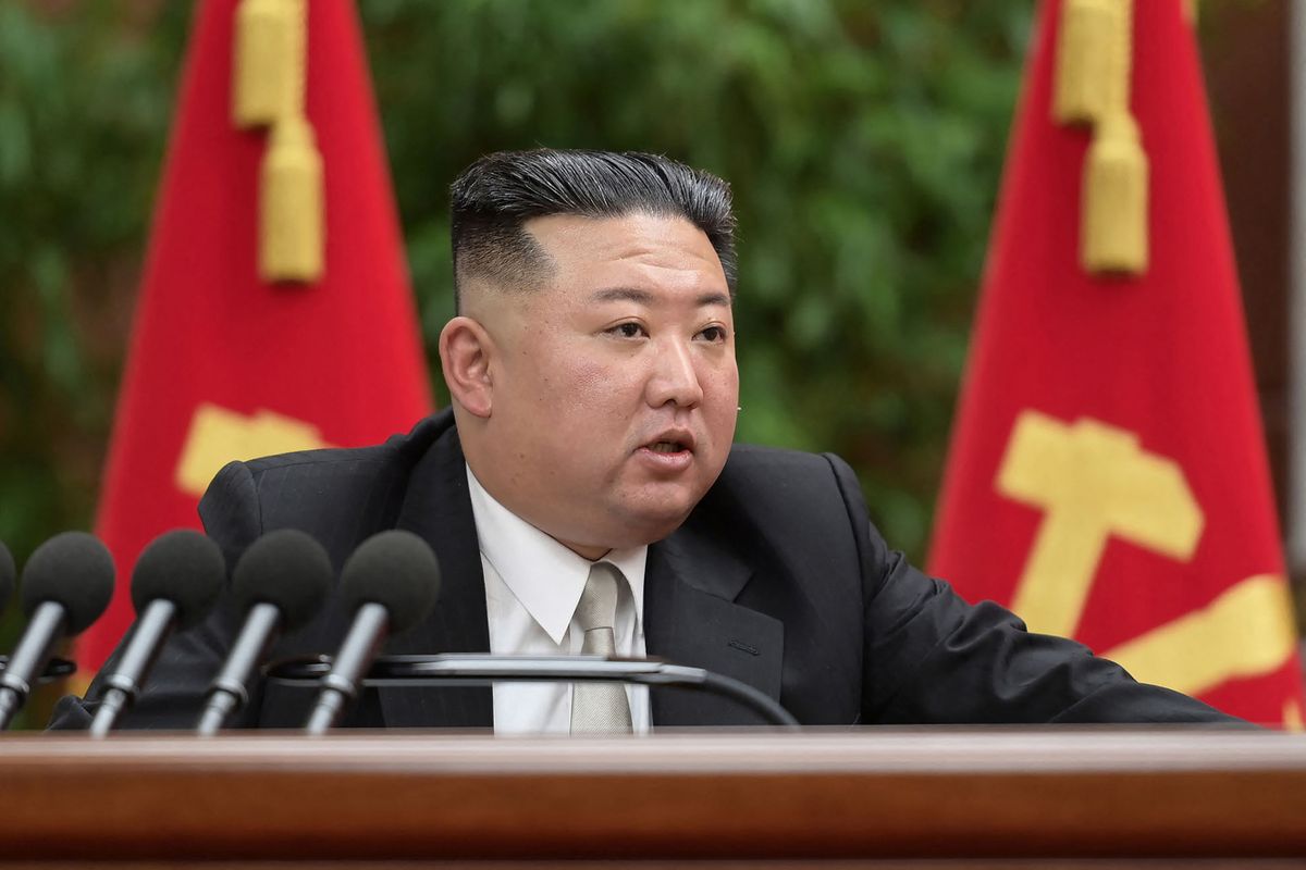 This picture taken on December 27, 2022 and released from North Korea's official Korean Central News Agency (KCNA) on December 28, 2022 shows North Korea's leader Kim Jong Un giving a report on the second day of the 6th expanded plenary session of the 8th Central Committee of the Workers' Party of Korea, at the Party Central Committee headquarters in Pyongyang. 
