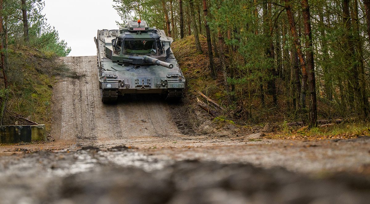Tank driving training of Slovak servicemen and women 24 November 2022, Lower Saxony, Munster: A Slovakian soldier drives a Bundeswehr Leopard II driving training tank, through the terrain during driving training. The Bundeswehr is currently training Slovakian soldiers on the Leopard 2 A4 main battle tank in Munster. The background to this is a ring exchange of 15 Leopard tanks to Slovakia commissioned by the German government, as the Bundeswehr announced on Thursday. Photo: Philipp Schulze/dpa (Photo by Philipp Schulze/picture alliance via Getty Images)