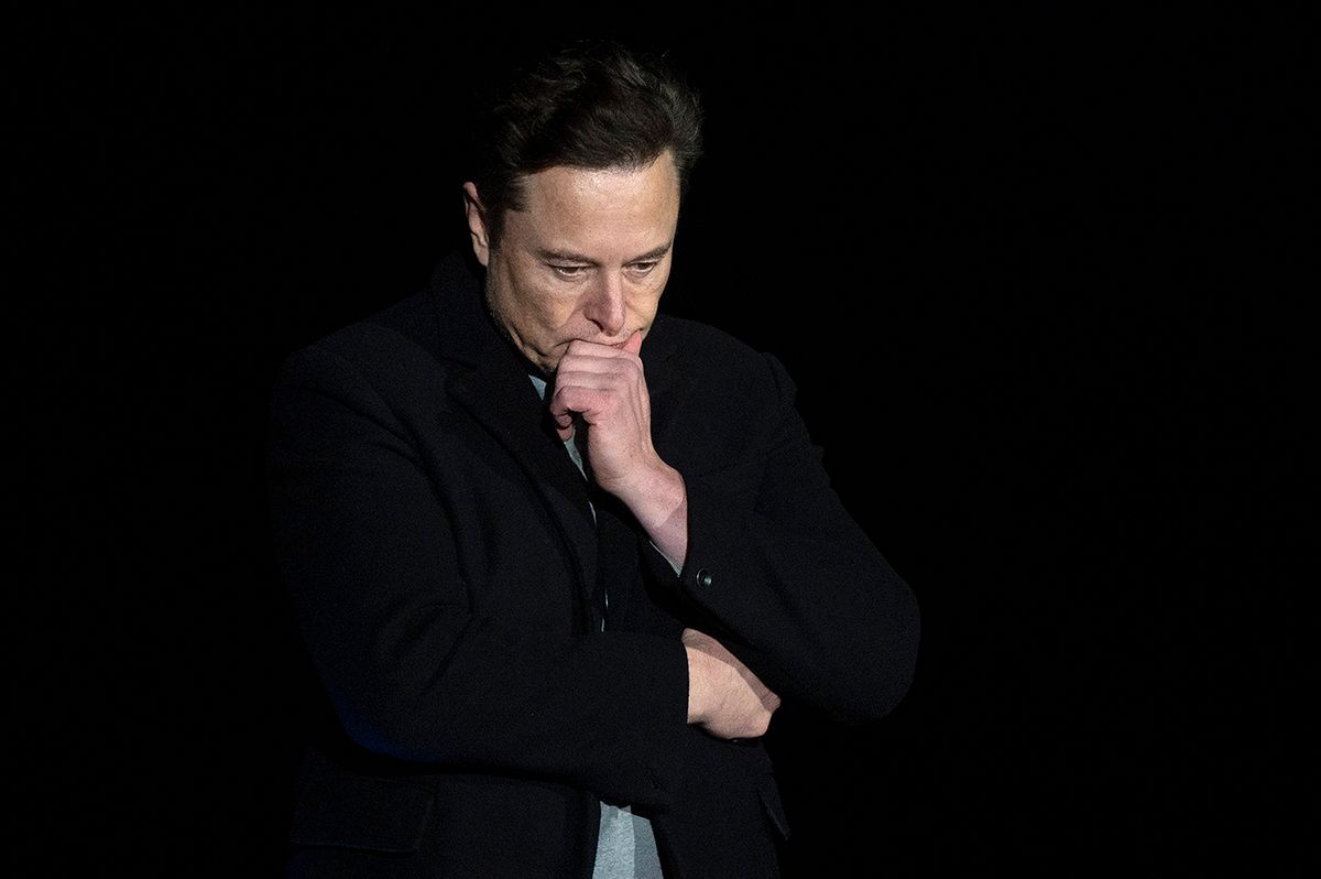 (FILES) In this file photo taken on February 10, 2022 Elon Musk pauses and looks down as he speaks during a press conference at SpaceX's Starbase facility near Boca Chica Village in South Texas. - A Twitter account that tracked flights of Elon Musk's private jet was grounded on December 14, 2022 despite the billionaire's talk of free speech. (Photo by JIM WATSON / AFP) FILES-US-INTERNET-AVIATION-TWITTER-MUSK