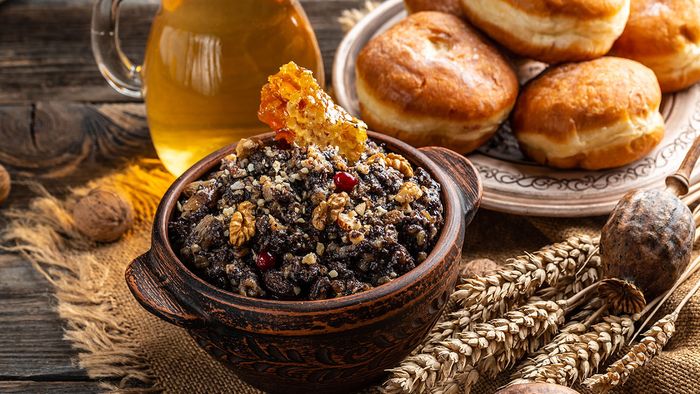 Kutia Boiled wheat porridge in a bowl. kutya Christmas food. traditional meals in eve Christmas Kutia Boiled wheat porridge in a bowl. kutya Christmas food. traditional meals in eve Christmas.