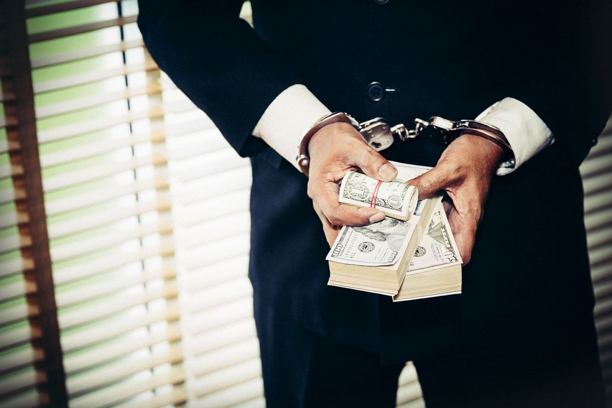 Dark,Business,Concept,:,Handcuffs,Arrested,,Male,Businessmen,Charged,With Dark business concept : Handcuffs arrested, male businessmen charged with carrying illegal counterfeit dollars., influencer, jail, börtön, 