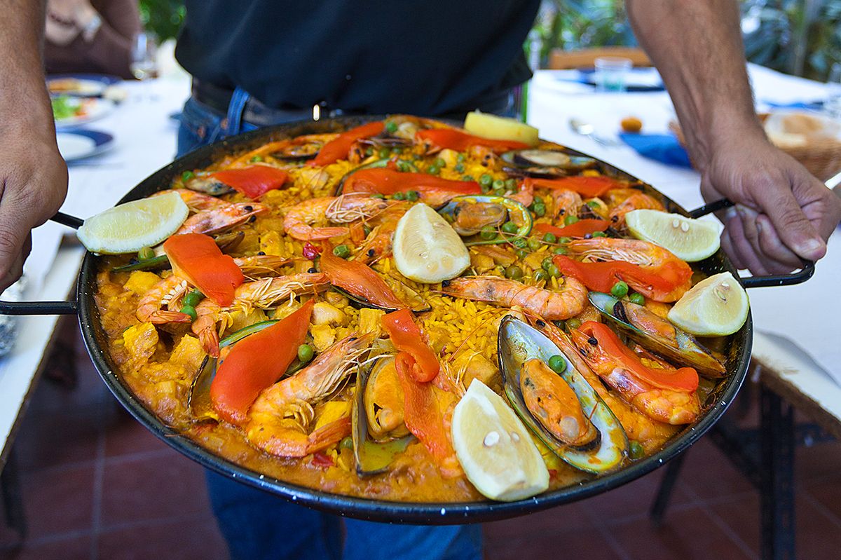 Seafood Paella Man Holding a Paella Pan, Gran Canaria, Spain