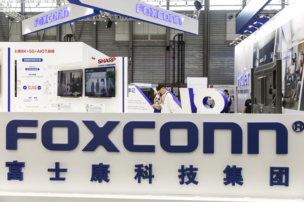 Products and Displays at CES Asia Signage for Foxconn Technology Group is displayed at the company's booth at the CES Asia 2018 show in Shanghai, China, on Wednesday, June 13, 2018. The show runs through June 15. Photographer: Qilai Shen/Bloomberg via Getty Images